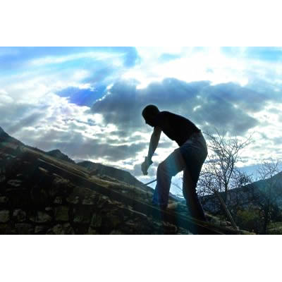 Roofing company worker on a roof